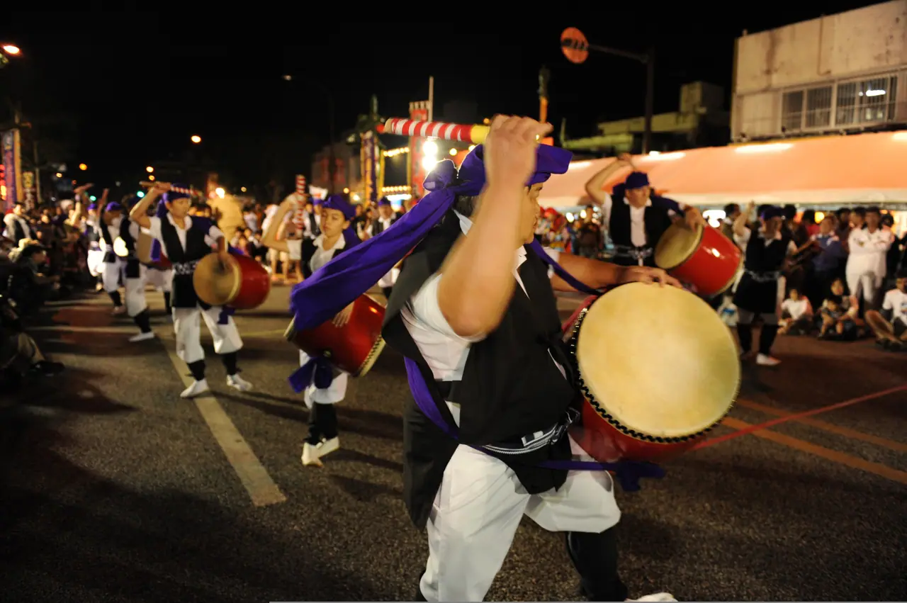 Eisa drummers performing at night