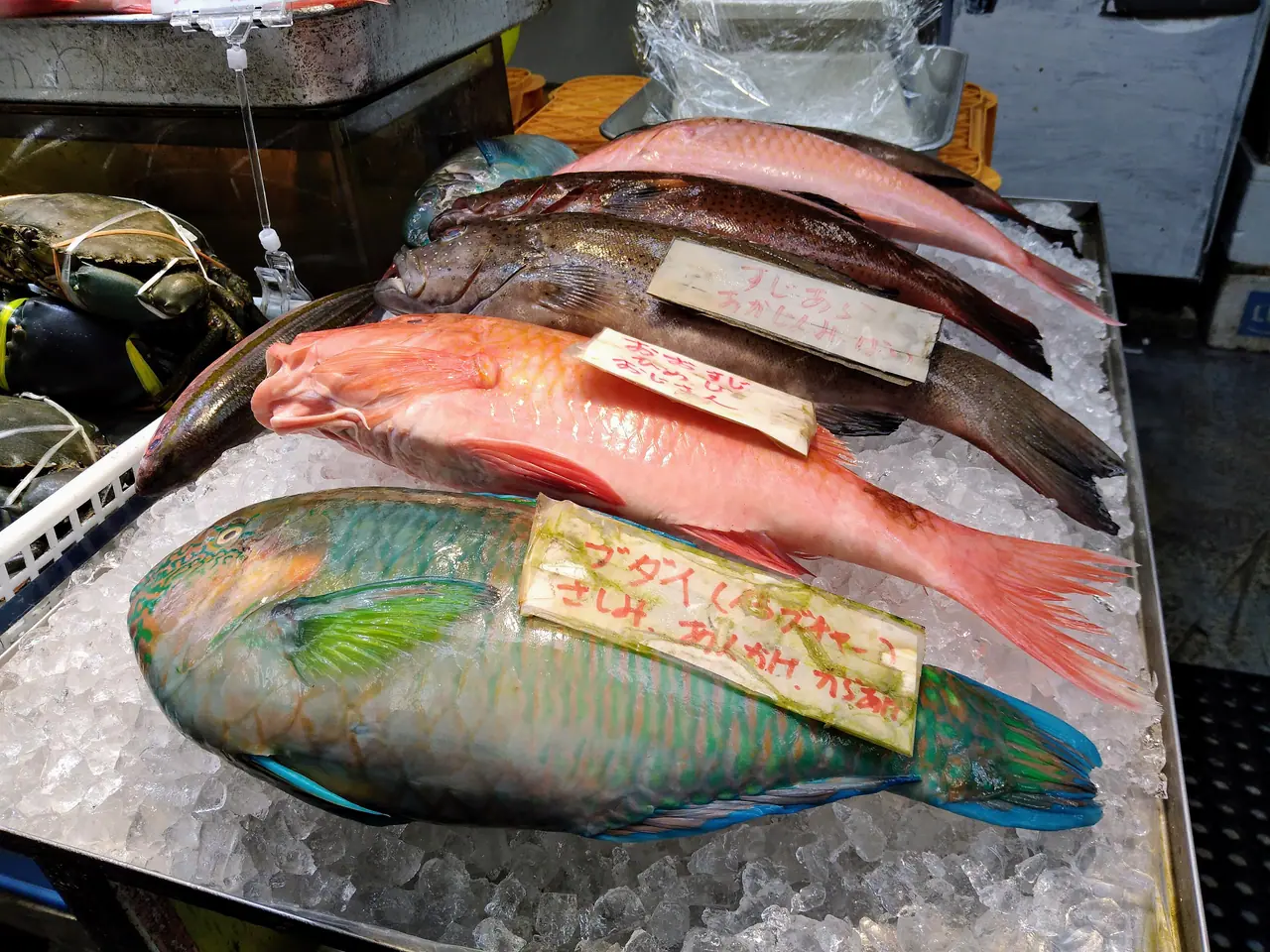 Colourful fish on ice at a stall in Makishi Public Market