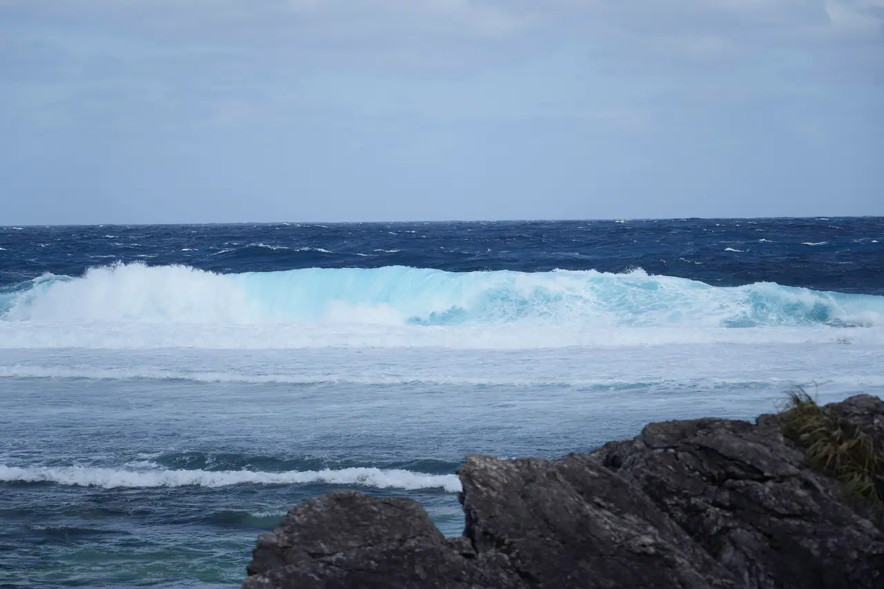 Waves breaking on the rocky coast of Iheya Island